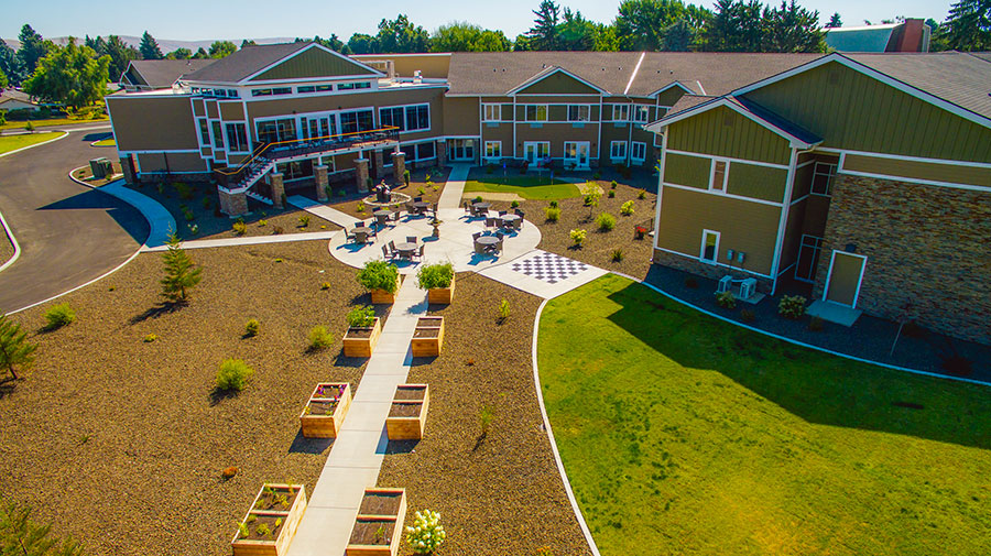 Aerial view of a landscaped courtyard and building complex.