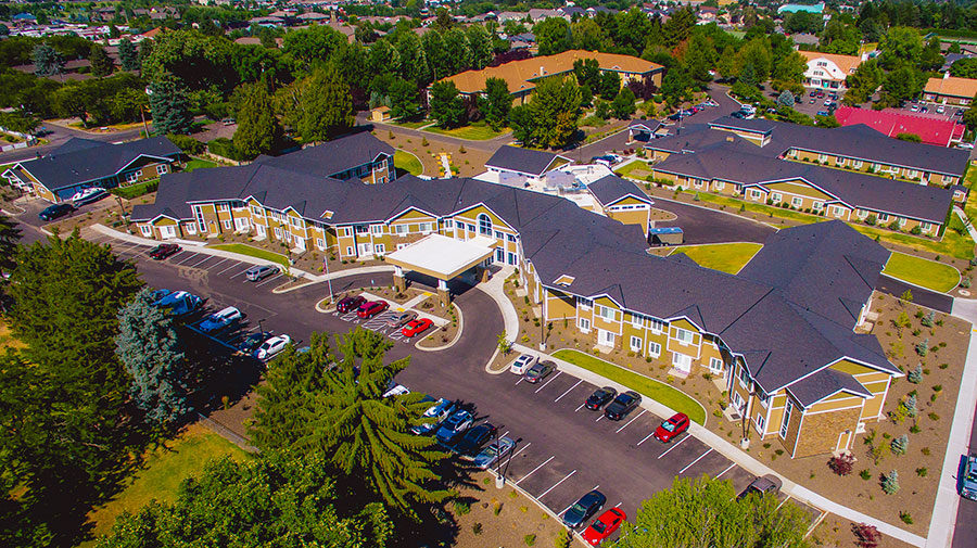 Aerial view of a residential complex with parking.